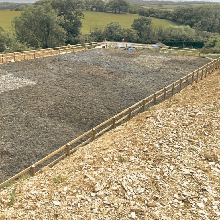 Standalone riding arena surfaced with Superior Fibre fibre surface